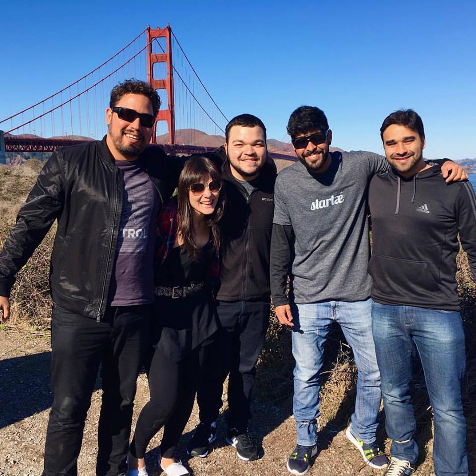 Team with the Golden Gate bridge behind